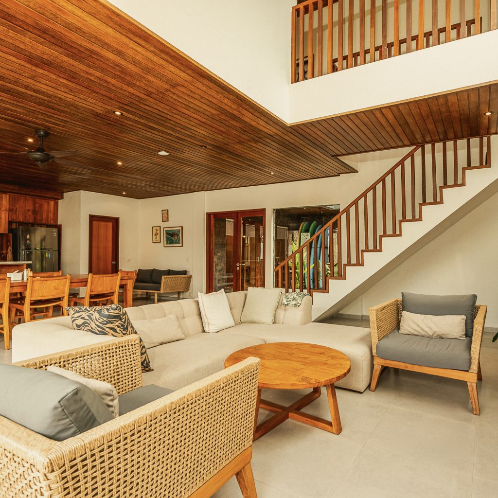Open-plan living and dining area with natural lighting at the surf stay accommodation in Bali.
